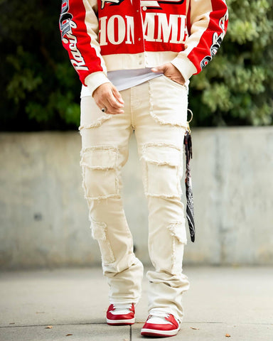 cream distressed stacked jeans example